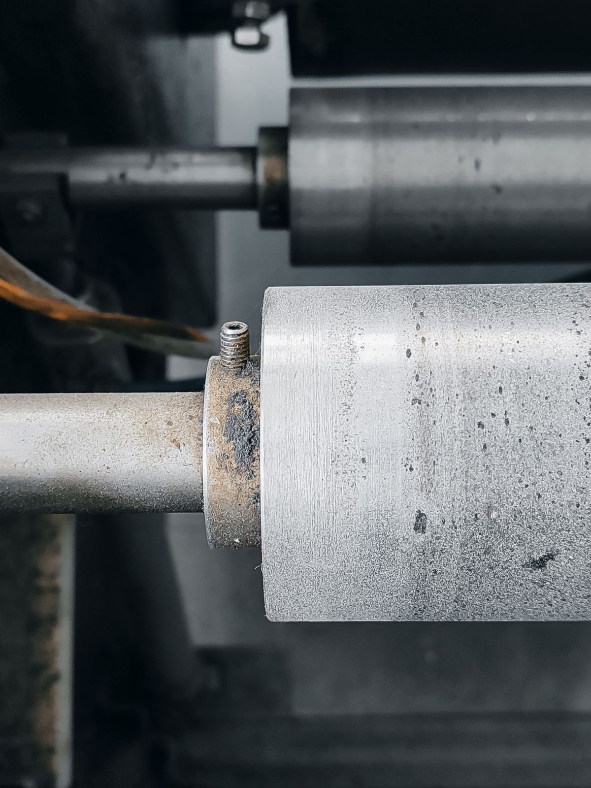 Close-up of a roller mechanism on industrial machinery