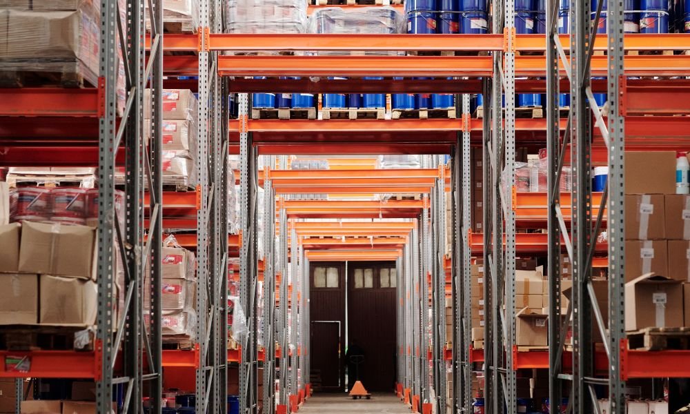 Bulk goods on warehouse racking - consolidating a China sourcing order before shipping to Bangladesh