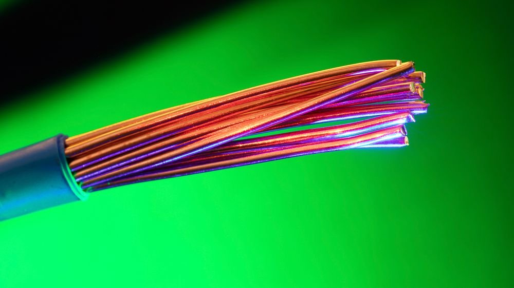 Close-up of stranded copper conductor stripped from a cable