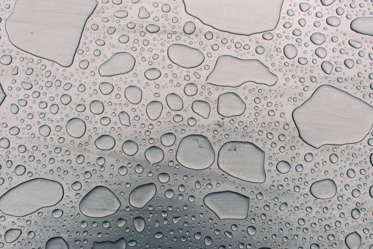 Water droplets condensed on a metal surface