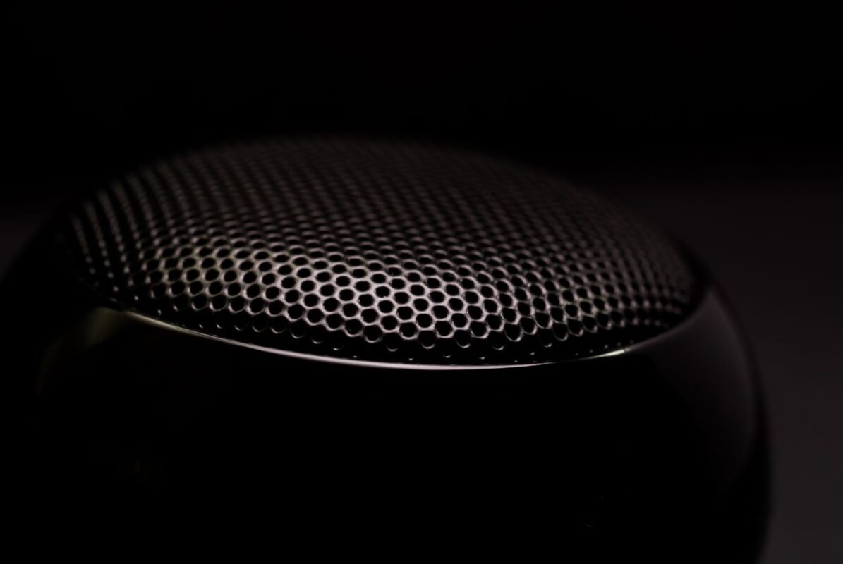 Close-up of a loudspeaker grill, a product that contains magnets