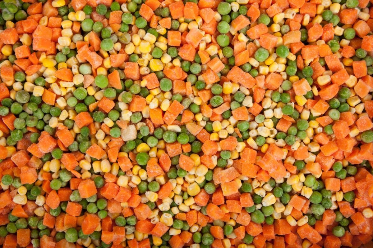Close-up of frozen mixed carrots, peas, and corn