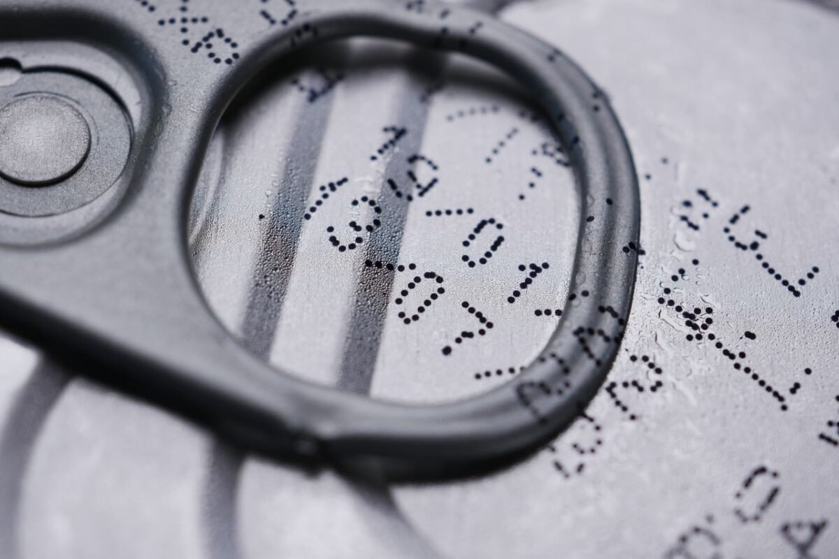 Printed batch and expiry date code on a packaged product lid