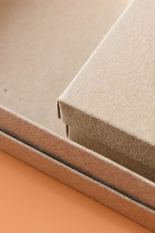 Close-up of a plain cardboard box and lid
