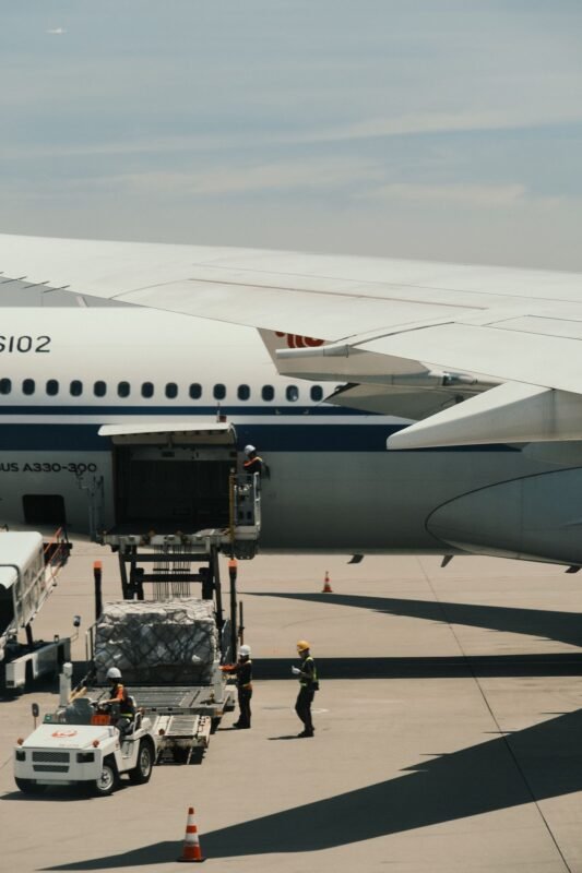 Air cargo pallet being loaded into a passenger aircraft hold