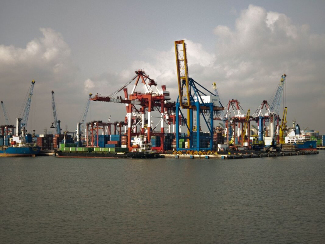 Busy Container Terminal with Multiple Cranes and Ships