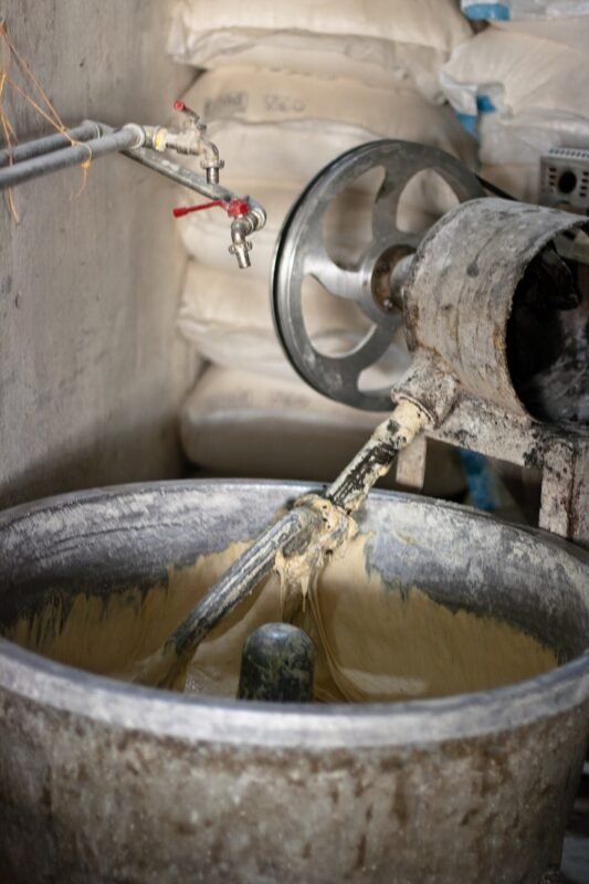 Bowl dough mixer kneading bread dough in a small bakery, the kind of machine Bangladeshi bakeries import from China