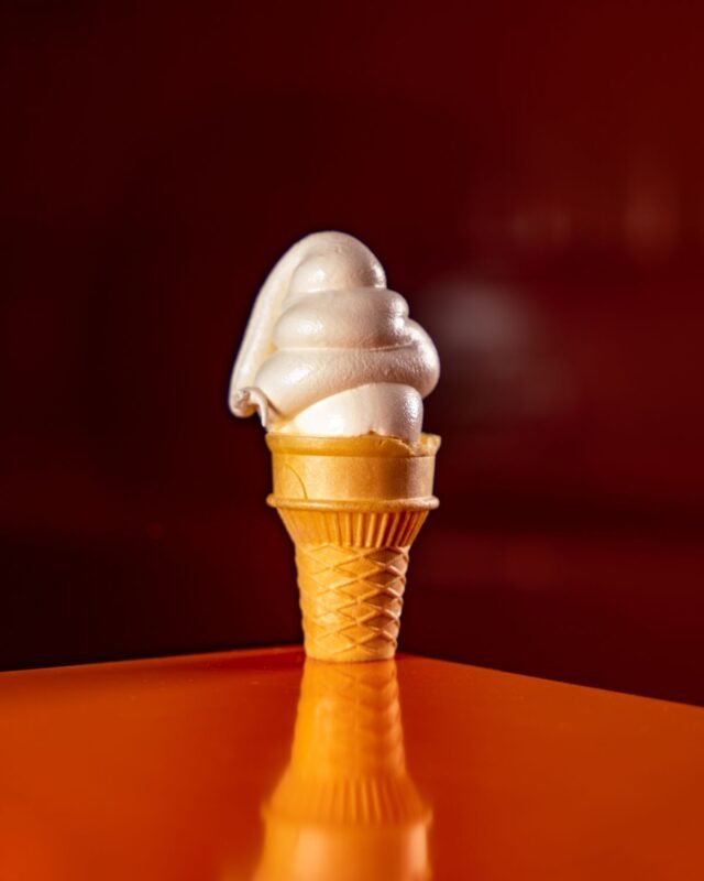 Vanilla soft serve ice cream swirled into a wafer cone