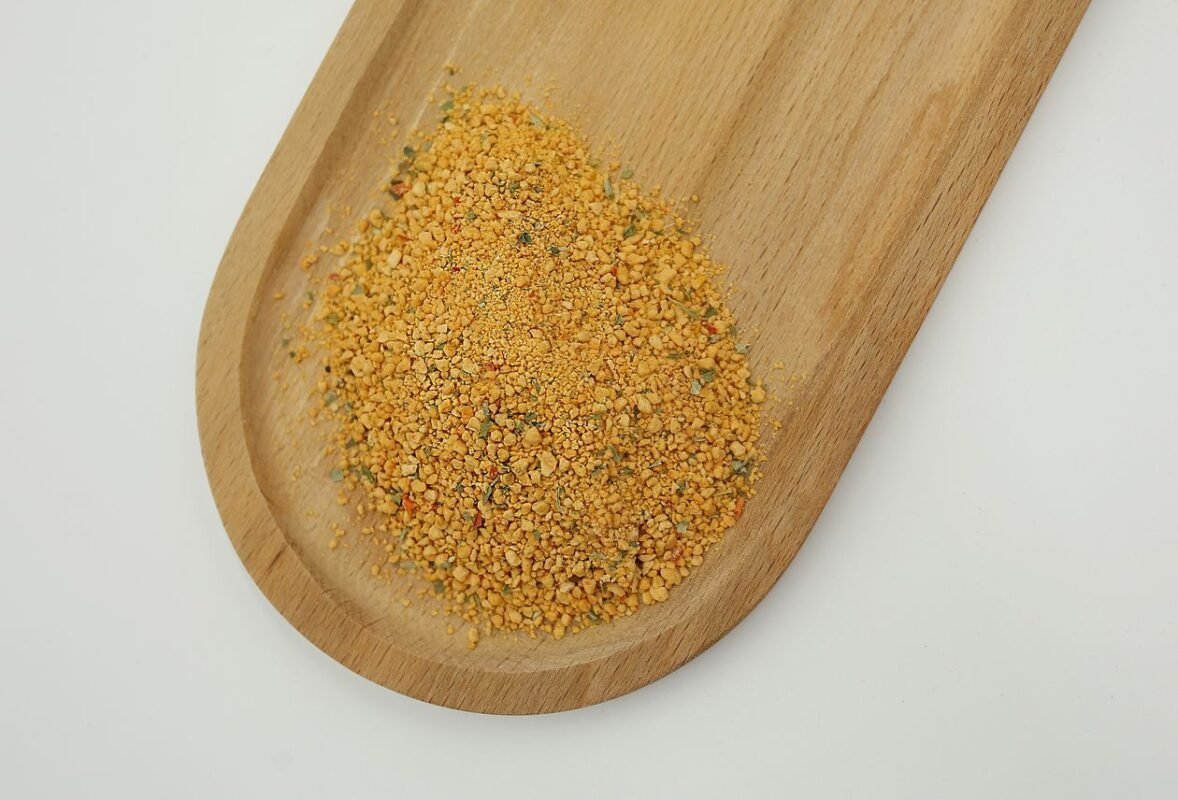 Savory seasoning powder blend on a wooden board