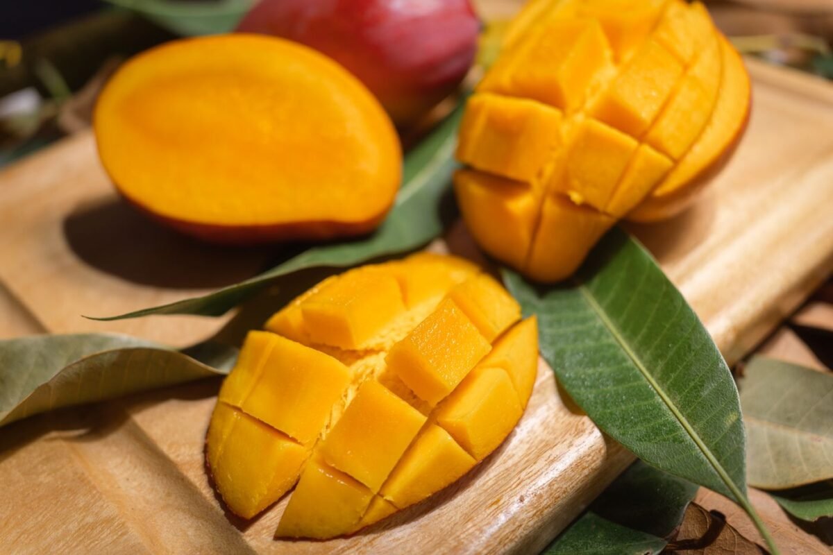 Ripe mango flesh cut into cubes for pulp processing