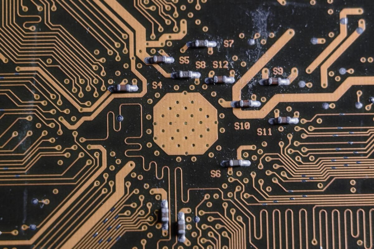 Close-up of a printed circuit board with exposed traces and components