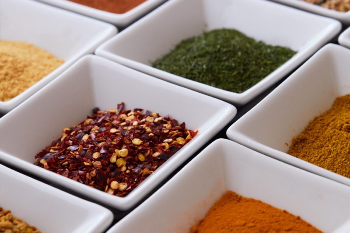 Bowls of chilli, turmeric and other spices that are sources of natural food colour
