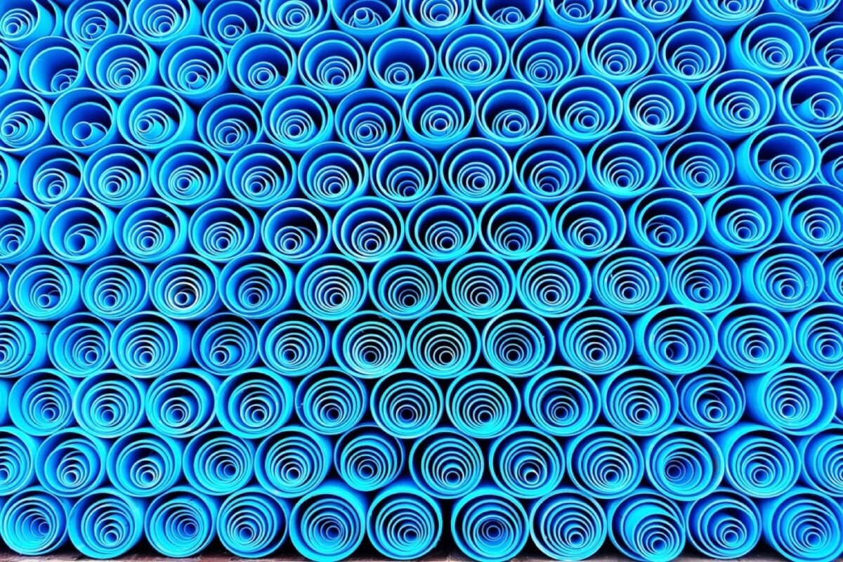 Stack of plastic water pipes viewed end-on